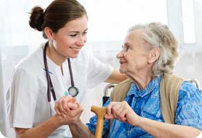 Senior woman with Med1Care home visiting nurse.